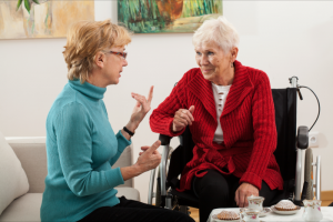 caregiver and patient talking